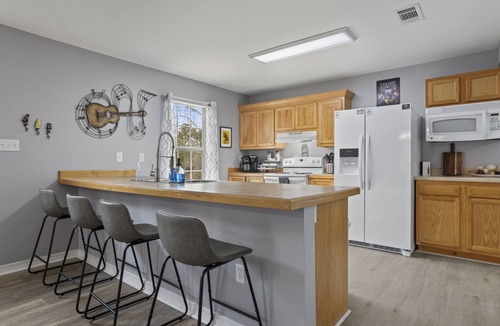 Shoreline Park House | Bay St. Louis Pool, Hot Tub, Ping Pong, Fire Pit, and Grill Waterfront Home