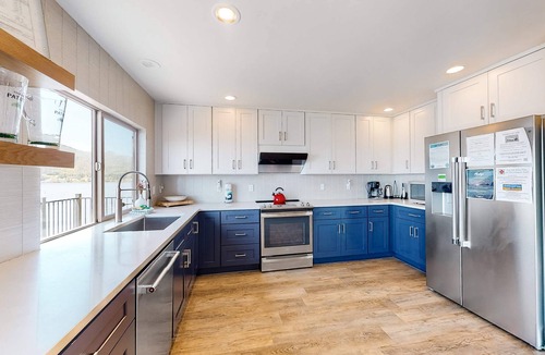 Bay City House | Bayview home with a deck overlooking the locally famous Ghost Hole fishing spot