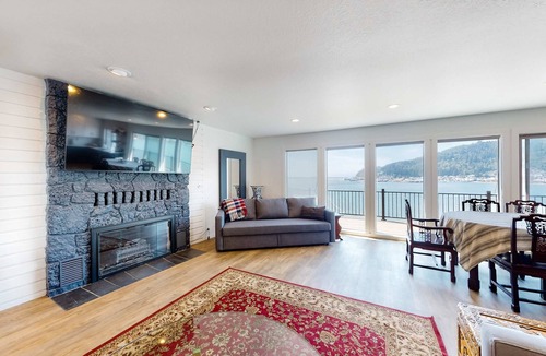 Bay City House | Bayview home with a deck overlooking the locally famous Ghost Hole fishing spot