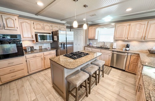 Holiday Isle Villa | BEACH BOATING PARADISE-Heated Pool,2 King Suites,90ft Dock,Game Room,Bikes,5Star
