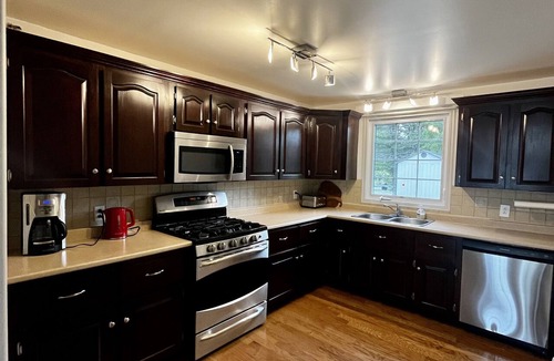 Marion Bridge House | Beachfront 4 bedroom home directly on the Mira River