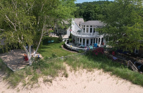 Frankfort House | Beachfront Home on Lake Michigan beach. Spectacular sunsets, walk to downtown.