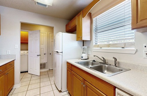 Sugar Beach Condo | Beachfront townhome w/on-site beach access, heated pool, patio, grill, AC, W/D