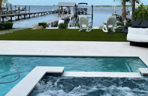 Key Largo House | Beautiful bay home with one-of-a-kind water view, pool,spa, an a private pier.