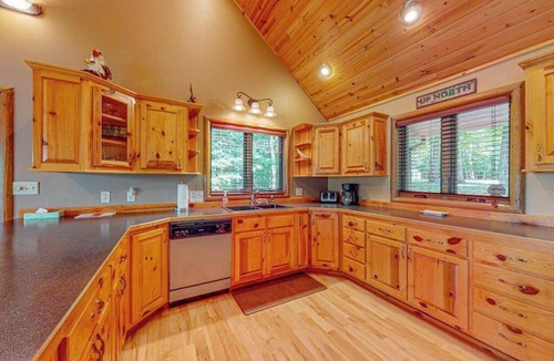 Presque Isle House | Beautiful Lakefront Cabin with a Private Dock, Firepit, and Large Yard!