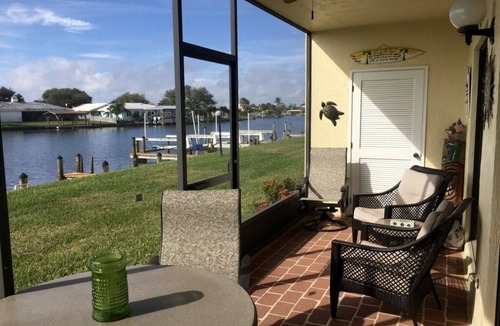 Cocoa Isles Condo | Beautiful sunsets from this ground floor Waterfront Condo - 3 month minimum