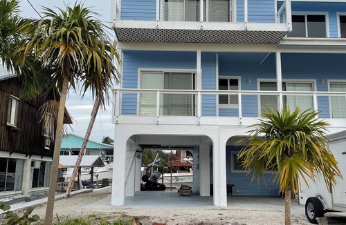 Port Pine Heights House | Big Pine House, 4/2 two story, canal access 75 ft dock and stunning Bay view.