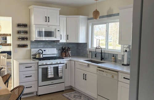 Newaygo House | Blue Haven Inn - Hess Lake Lakefront Property - Hot Tub, Kayaks, Central AC
