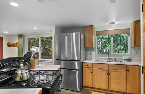 Brightwood Cabin | Boulder Creek Retreat: A cozy chalet for 6 with a hot tub by the creek.
