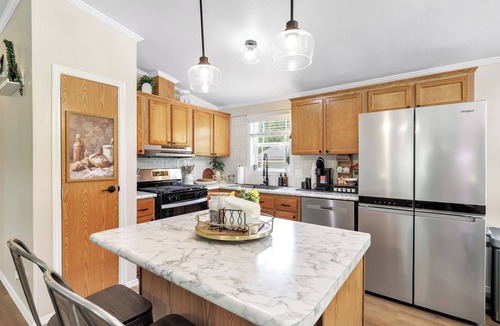 Mountain House | Brand new listing! Relax and unwind at this stunning Northwoods pool house featuring a private in-ground pool, fire pit, patio, garage space, and sleeping for 11 guests!