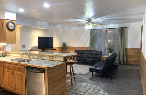 Tomahawk House | Bridge Inn Tomahawk - Suite 101, Kitchen, 1 Kind Size Bed, 2 Futons, Walkout, River View