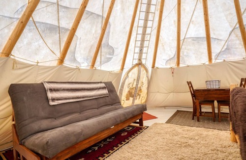 Hot Springs RV Rental | Buffalo Glamping Tipi with King Bed in Black Hills
