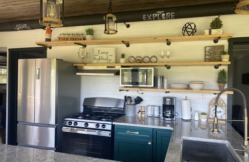 Wellston Cabin | Camp HighBridge 2 Bed 1 Bath Big Manistee River, Private Frontage. Bunk House!