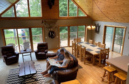Chief Lake Cabin | Captivating Views of Lake Chippewa from Three Level Chalet Cabin & Lake Home
