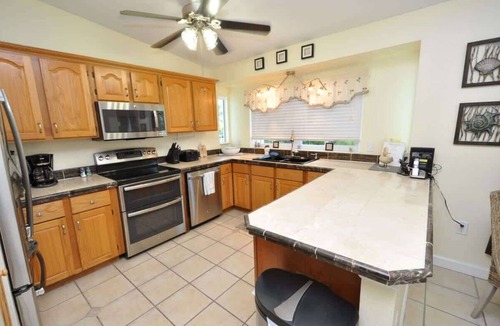 Breezeswept Beach Estates House | Cayman Cottage | 3 bed/2 bath canalfront home