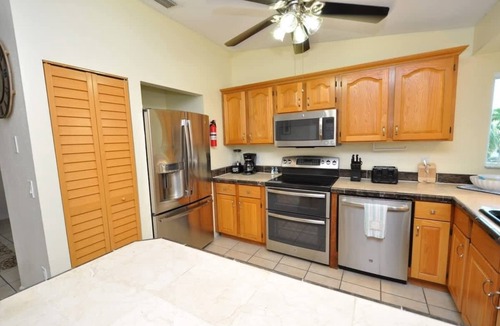 Breezeswept Beach Estates House | Cayman Cottage | 3 bed/2 bath canalfront home