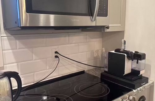 Kennedy King Apartment | Charming 1-bedroom carriage house apartment with private garage