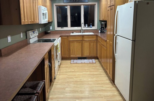 Mullett Lake House | Charming 2-bedroom 1-full bath upstairs house less than 1/2 mile to Mullett Lake
