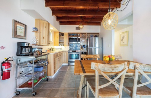 Upper Matecumbe Key Cottage | Charming Bayfront Cottage in Heart of Islamorada with Heated Pool, Deep Dockage, Kayaks & More
