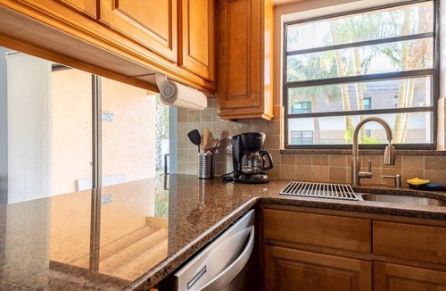 Indialantic Condo | Charming Beachside Escape Patio Parking