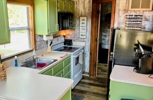 Okeechobee Cabin | Charming Gingerbread Cabin on Lake Okeechobee