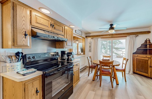 Conover House | Charming lakefront home with dock, fireplace, streaming, lake views, W/D, & AC