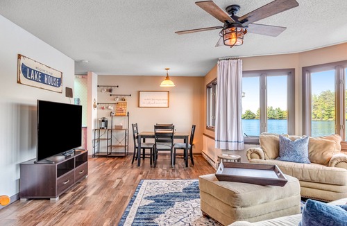 Three Lakes Cabin | Charming lakefront cabin with fireplace, on-site hot tub, firepit & games