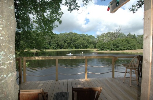 Elmo Cabin | Charming Waterfront Treehouse in Kaufman Texas