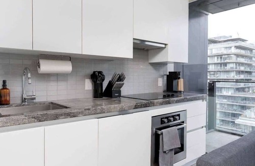 Fashion District Apartment | Chic downtown condo with patio Stylish 1BR retreat