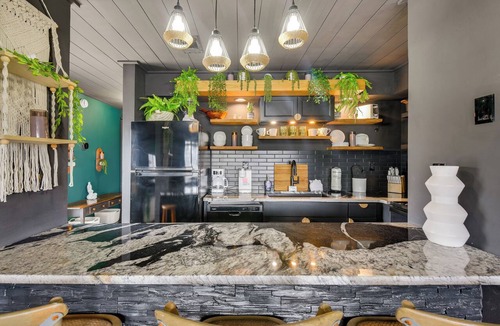 Holiday Beach Condo | Chic & Elevated Decor: Beachfront PCB Gem w/Patio
