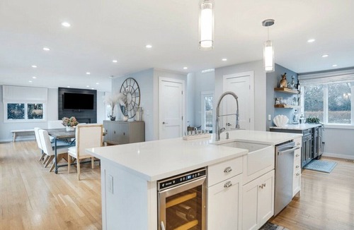 Quogue House | Classic Shingled Cape in Quogue, Private Pool, Expansive Deck, Prime.