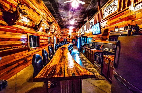 Belle Prairie City Cabin | Comfortable lodging with full bar. Kids stay free!