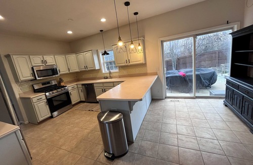 Fort Wayne House | Conveniently located home w/private backyard!