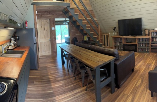 Lindale Cabin | Coyote Creek A-Frame Cabin with Firepit, Nature Trail, Games, Outside Activities