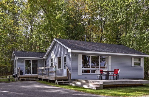 Burt Lake House | Cozy Alanson Cabin - steps to dock on Lake Burt!
