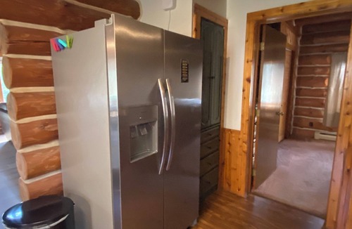 Pentwater Cabin | Cozy cabin on the Pentwater River with hot tub, central air and ample parking.