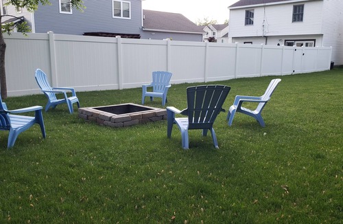 Grand Haven House | Cozy efficiency upper, a short walk downtown. Pet friendly with large backyard!