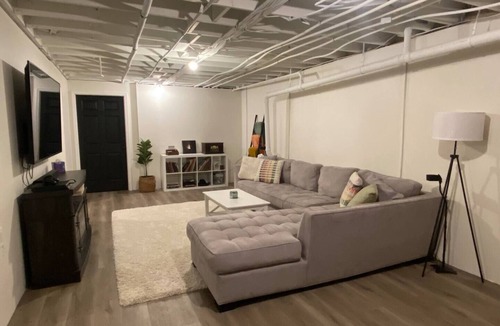 Evans Mills House | Cozy Industrial Apartment