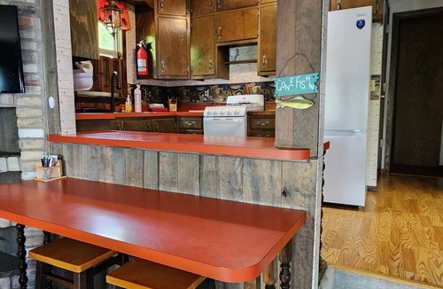 Webster House | Cozy Lakefront Cabin Retreat with Private Dock