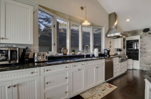 Mullett Lake Cottage | Cozy Mullett Lake Paradise- Lakefront property with Year-Round Recreation!