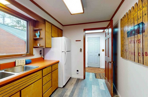 Manitowish Waters Cabin | Cozy riverfront cabin with dock, fire pit, and WiFi on the 10-Lake Chain