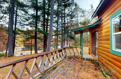 Manitowish Waters Cabin | Cozy riverfront cabin with dock, fire pit, and WiFi on the 10-Lake Chain