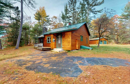 Manitowish Waters Cabin | Cozy riverfront cabin with dock, fire pit, and WiFi on the 10-Lake Chain