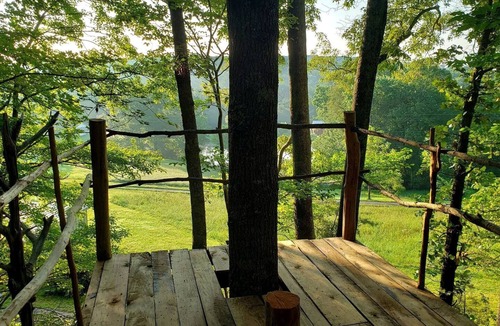 Grandview RV Rental | Cozy Treehouse Tent with Forest Trails near Waterfalls in Cumberland Plateau, TN