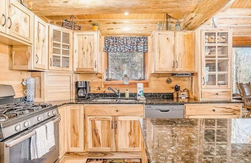 Thompsonville House | Delightful Riverfront Cabin with Wood-Burning Fireplace and Gas Grill & Hot Tub