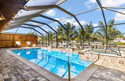 Fort Myers Villa | Direct Access Waterfront Villa with Heated Pool & Spa Edgewater Escape Roelens Vacations