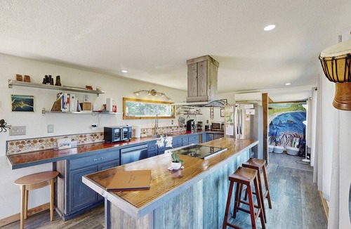 Port Orford Cabin | Dog-friendly cabin tucked Into the trees with WiFi, washer&dryer, & ocean views
