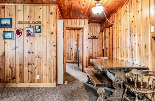 Presque Isle Cabin | Dog-friendly lakefront cabin with swimming, fishing, boating, & rec room