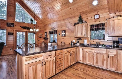 Eagle River House | Dog-friendly lakefront lodge with firepit, dock, & gas fireplace