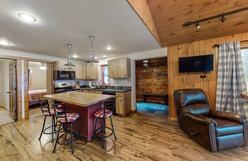 Tomahawk House | Dog-friendly lakefront home with high-speed WiFi, dock, private w/d, & firepit